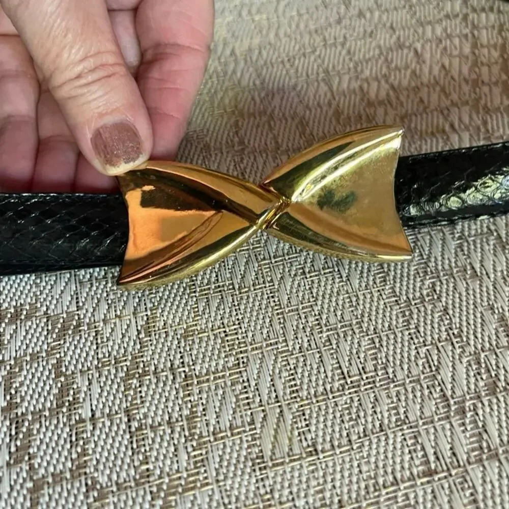 Vintage Dame black eelskin belt gold clip sz S